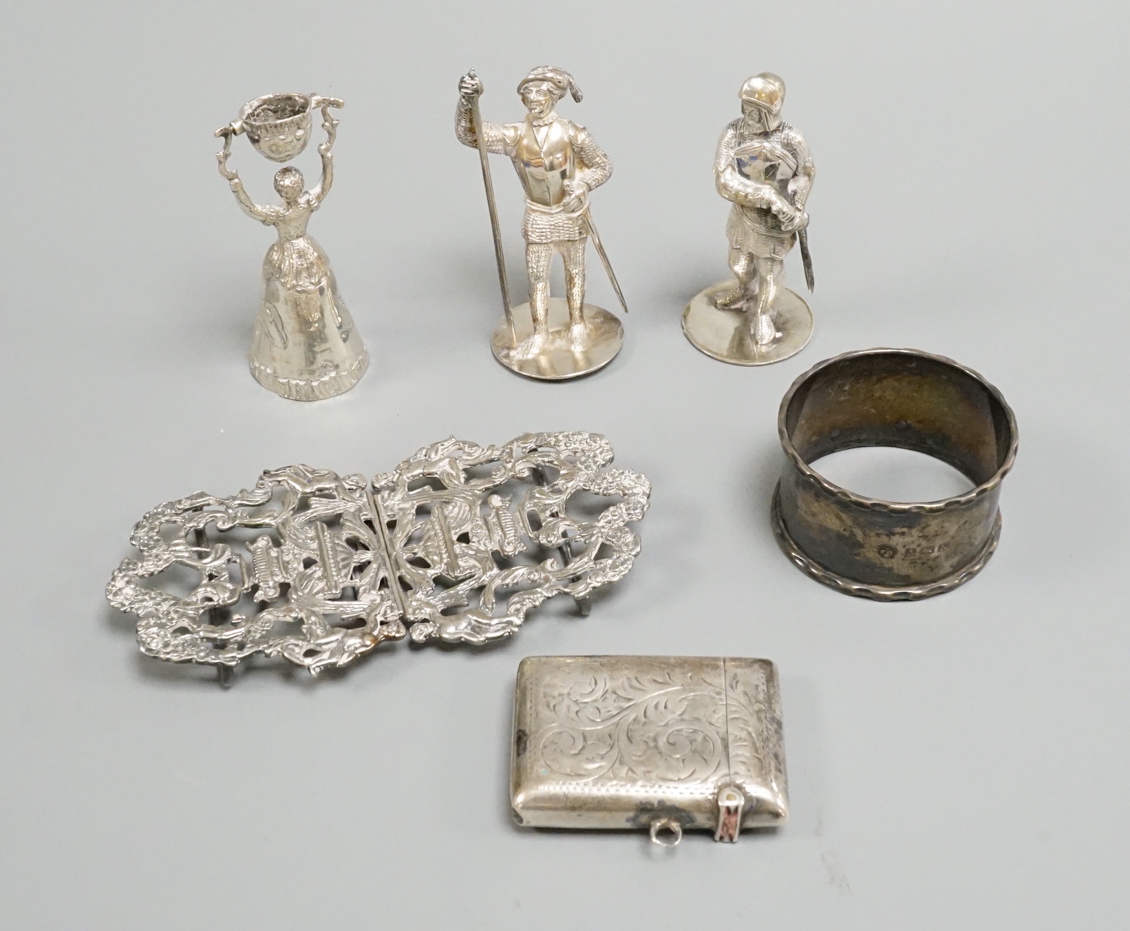 A continental 800 standard white metal miniature wager cup, 64mm, a modern silver belt buckle, silver vesta case and three other items.